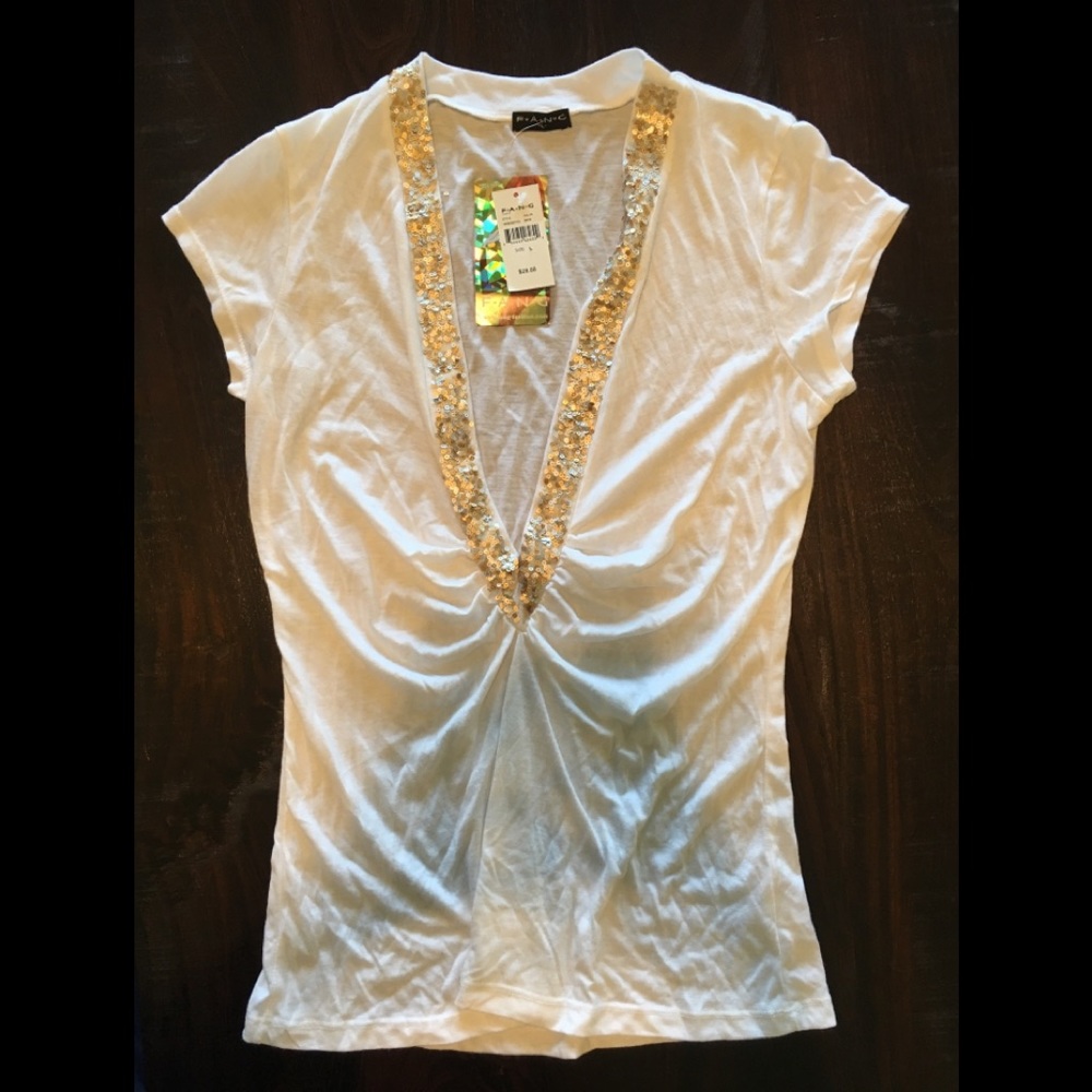 Fang. L. White shirt!